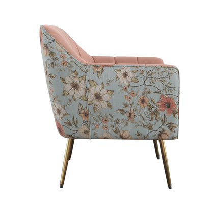 Side view of the Accent Chair - Rose Pink, featuring gold metal legs, a pink cushioned seat, and blue floral fabric with large flowers and leaves on the back and sides.