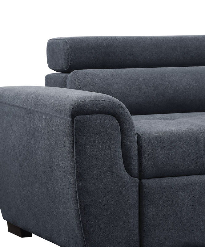 Close-up of the Haris Fabric Sleeper Sofa Sectional in dark gray, featuring wide cushioned armrests, a plush backrest, adjustable headrest, and storage ottoman, shown against a white background.