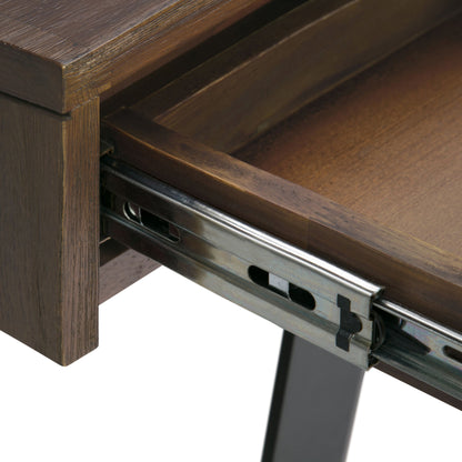 Close-up of the Lowry - Handcrafted Desk, featuring a partially opened wooden drawer with visible metal sliding rails and mechanisms attached inside.