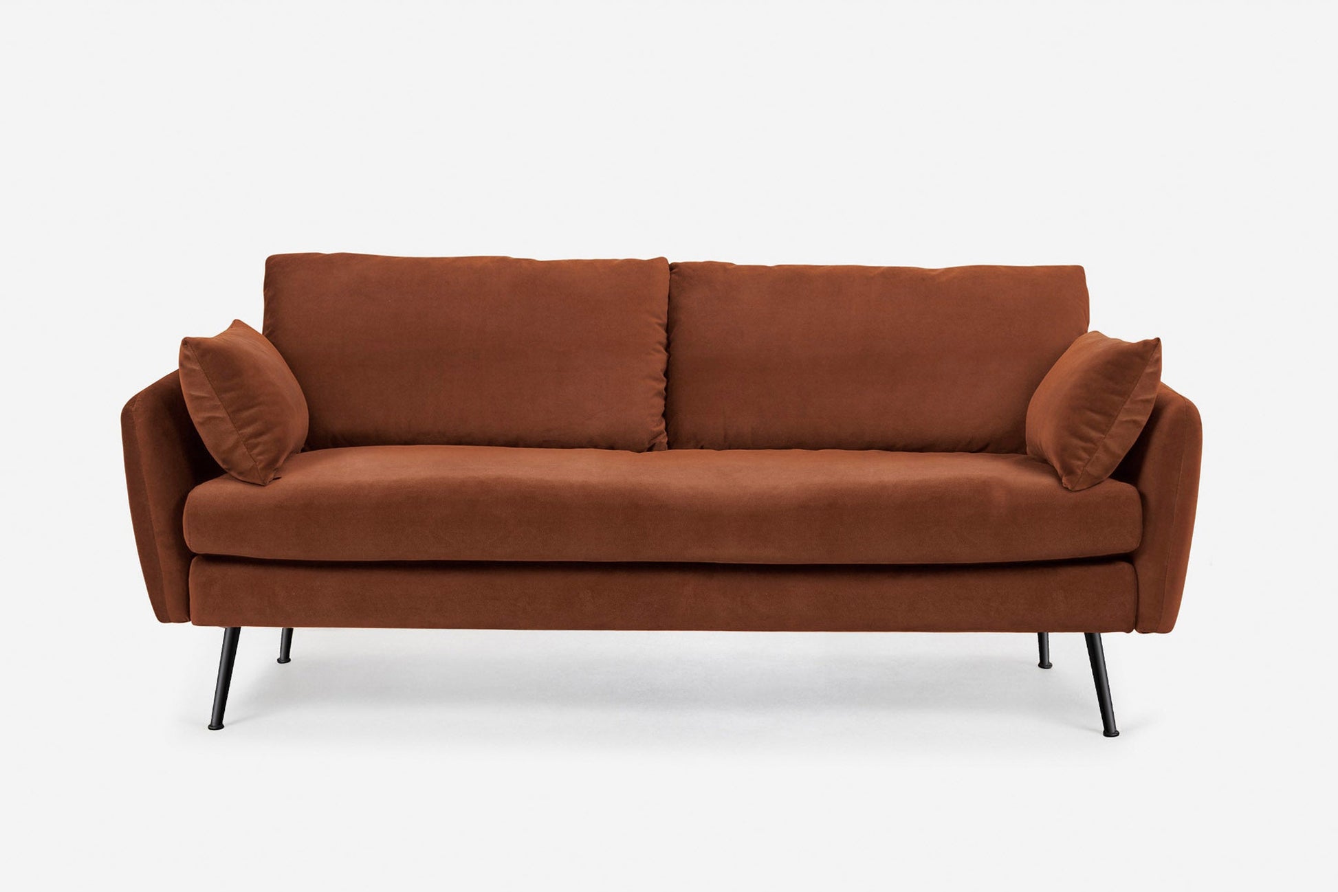 The Park Sofa is a modern brown fabric sofa featuring two seat and back cushions, two matching side pillows, and slim black metal legs, shown against a plain white background.