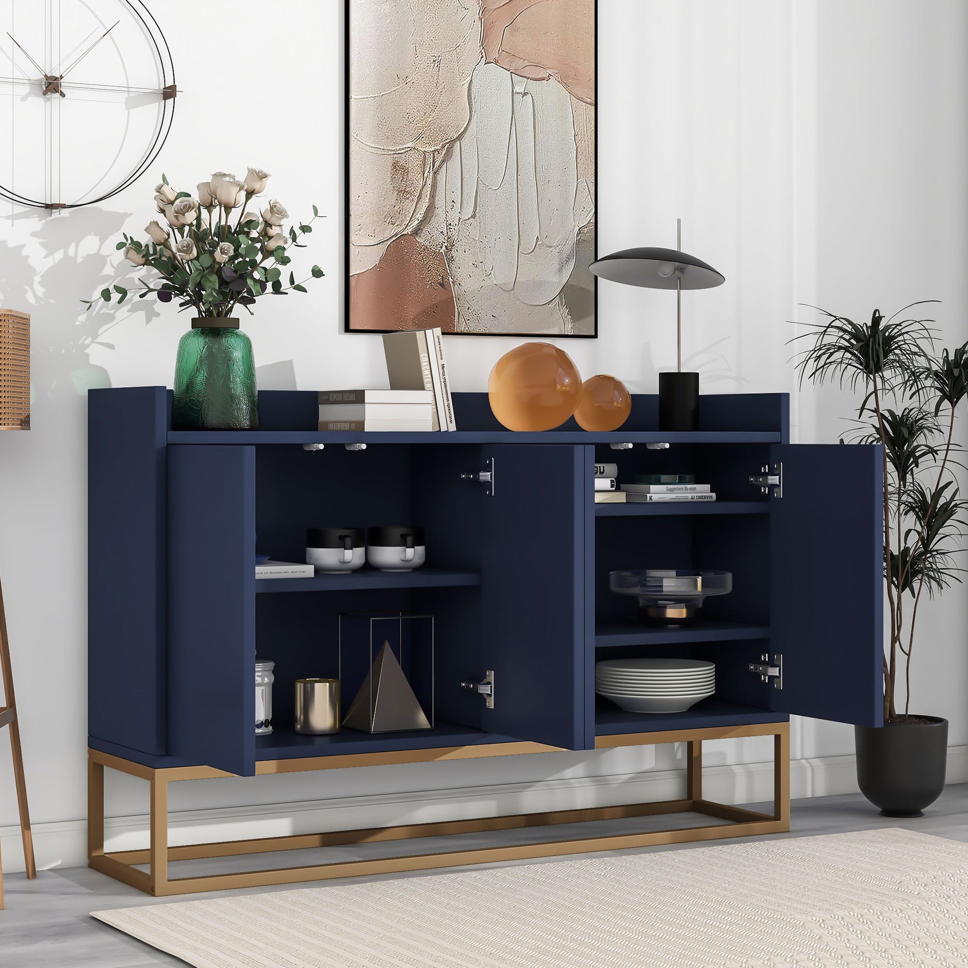 The Modern Sideboard Elegant Buffet Cabinet With Large Storage Space For Dining Room, Entryway stands against a white wall with gold legs, decorated with vases, books, and art. Its open doors reveal neatly arranged dishes and decor items inside.