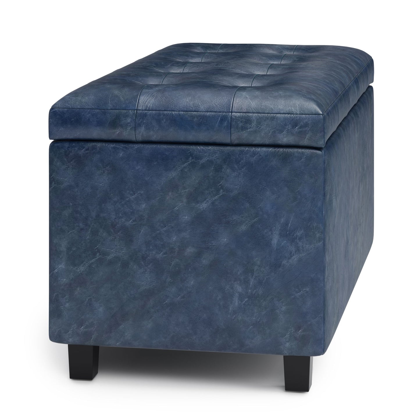 The Cosmopolitan Upholstered Storage Ottoman features a rectangular dark blue design, stitched cushioned lid, and four short black legs for style and storage.