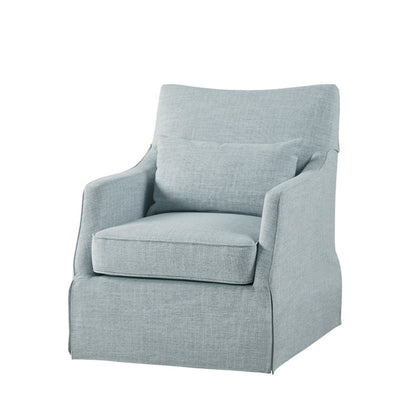 The Traditional Design London Skirted Swivel Chair features light blue upholstery, a cushioned seat and backrest, a matching pillow, and fabric-covered legs for a modern look with clean lines.