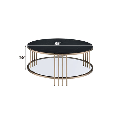 The Abisha - Sintered Stone Top Round Table features a black round top (35" diameter x 16" high), multiple vertical gold metal legs, and a lower glass shelf.