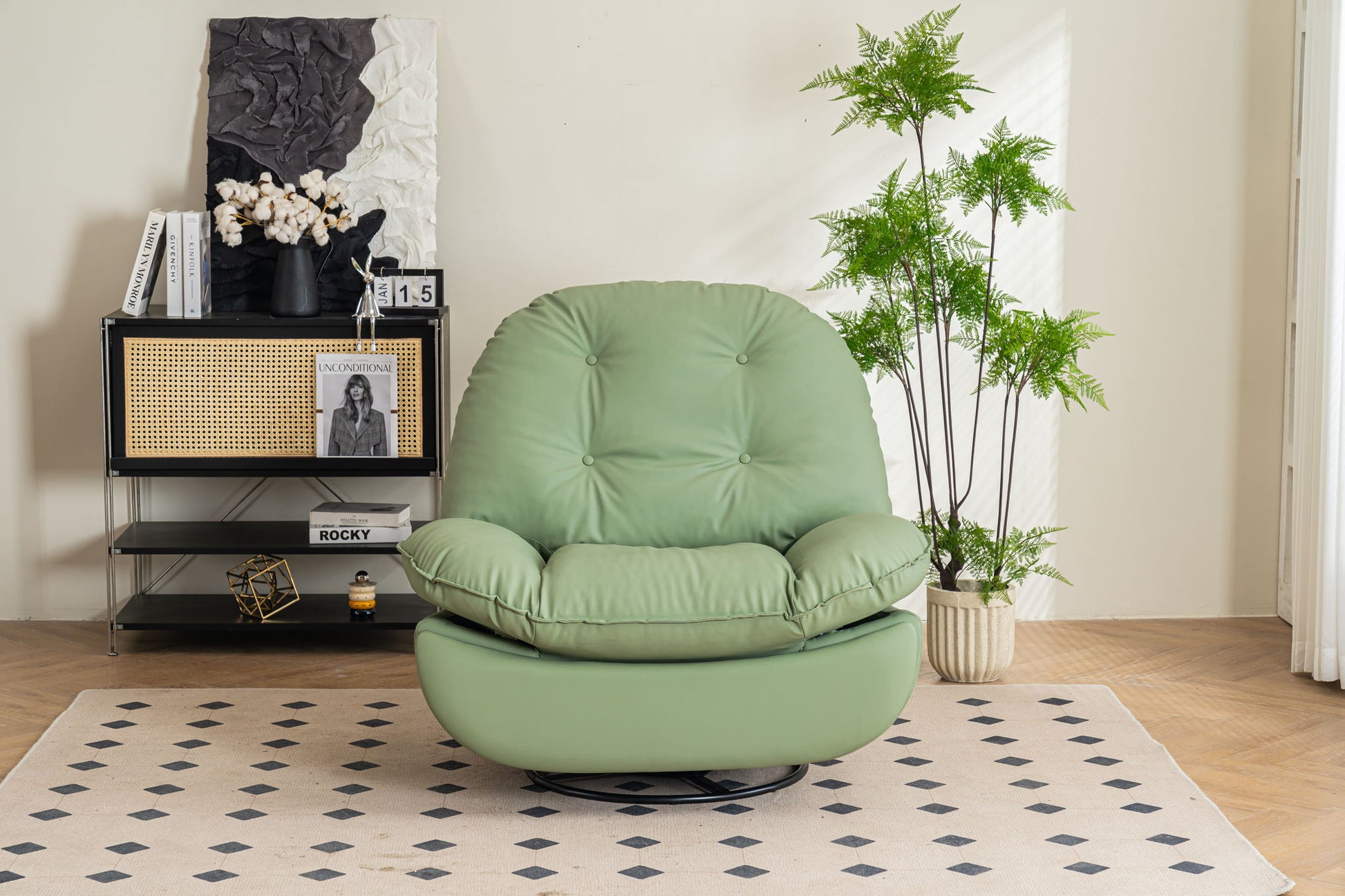 A modern living room featuring the Power Recliner Swivel Glider with USB charger, Bluetooth music player, a black metal shelf with decor and magazines, a tall potted plant, and a light rug with black diamond pattern on wooden flooring.