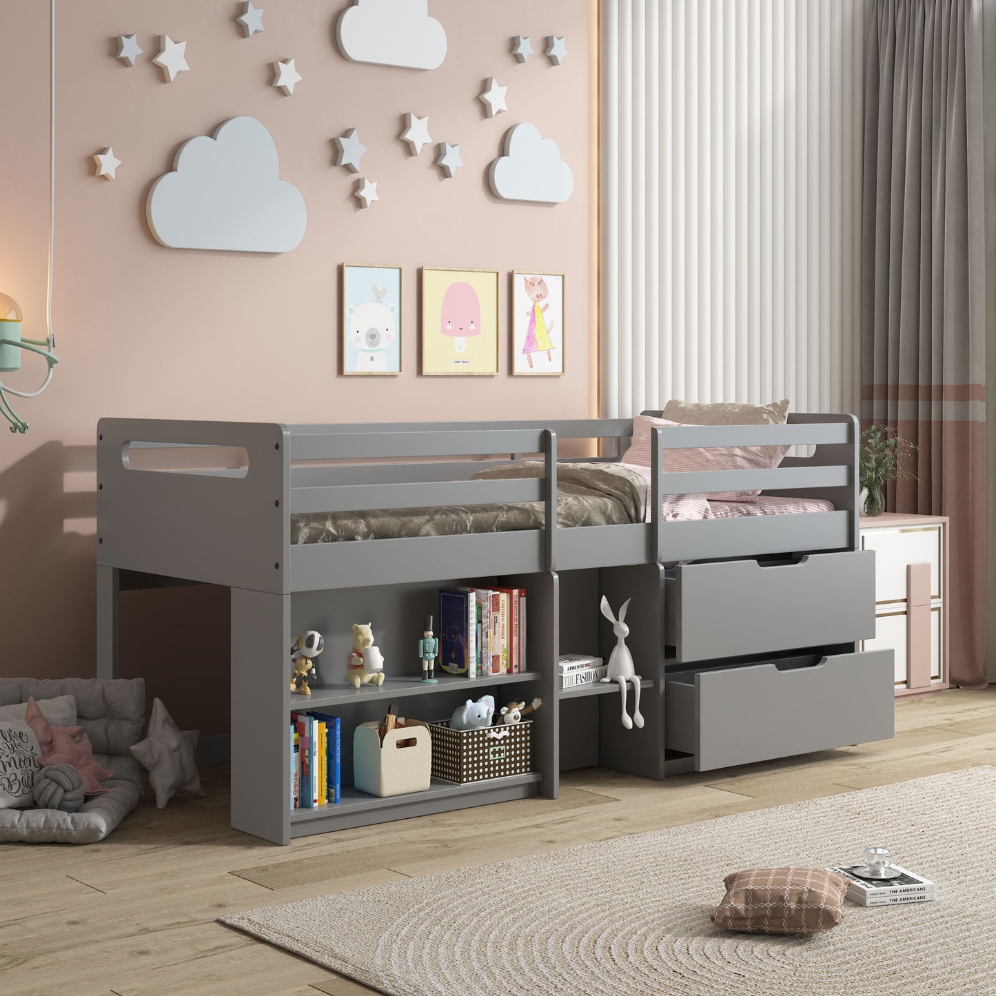 A modern kids’ bedroom with the Fabiana Twin Loft Bed With Storage in gray, built-in shelves and drawers, pink walls with cloud and star art, framed animal prints, toys, and a wooden floor.