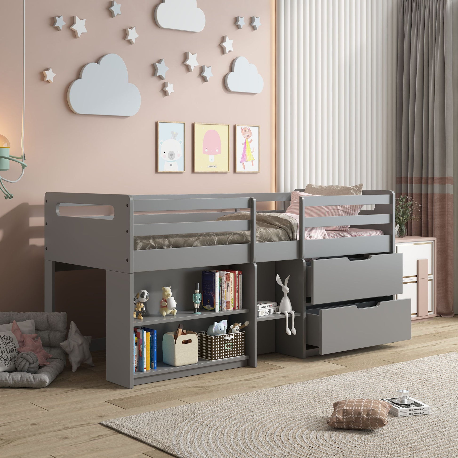 A modern kids’ bedroom with the Fabiana Twin Loft Bed With Storage in gray, built-in shelves and drawers, pink walls with cloud and star art, framed animal prints, toys, and a wooden floor.