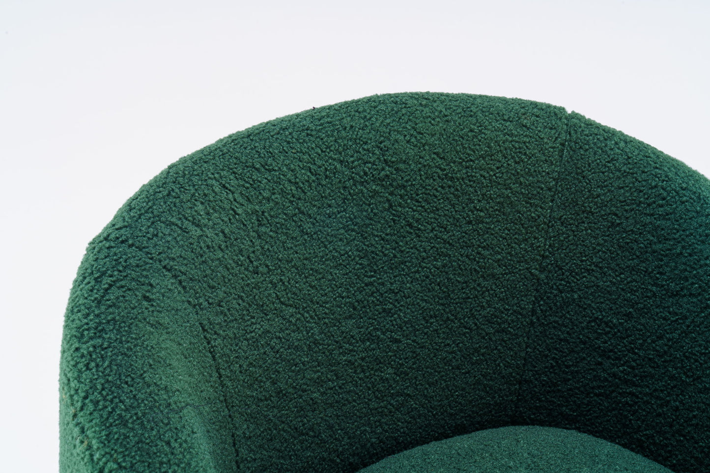 Close-up of the backrest and seat of the Teddy Fabric Swivel Accent Armchair Barrel Chair, featuring textured green fuzzy upholstery and a powder-coated metal ring base against a plain white background.