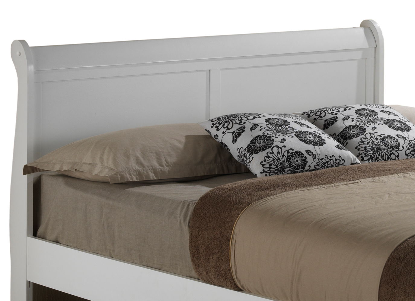 The Elegant Trundle Bed With Timeless Charm features a white wooden frame, a beige sheet, brown blanket and pillow, plus two decorative pillows with a black floral pattern.