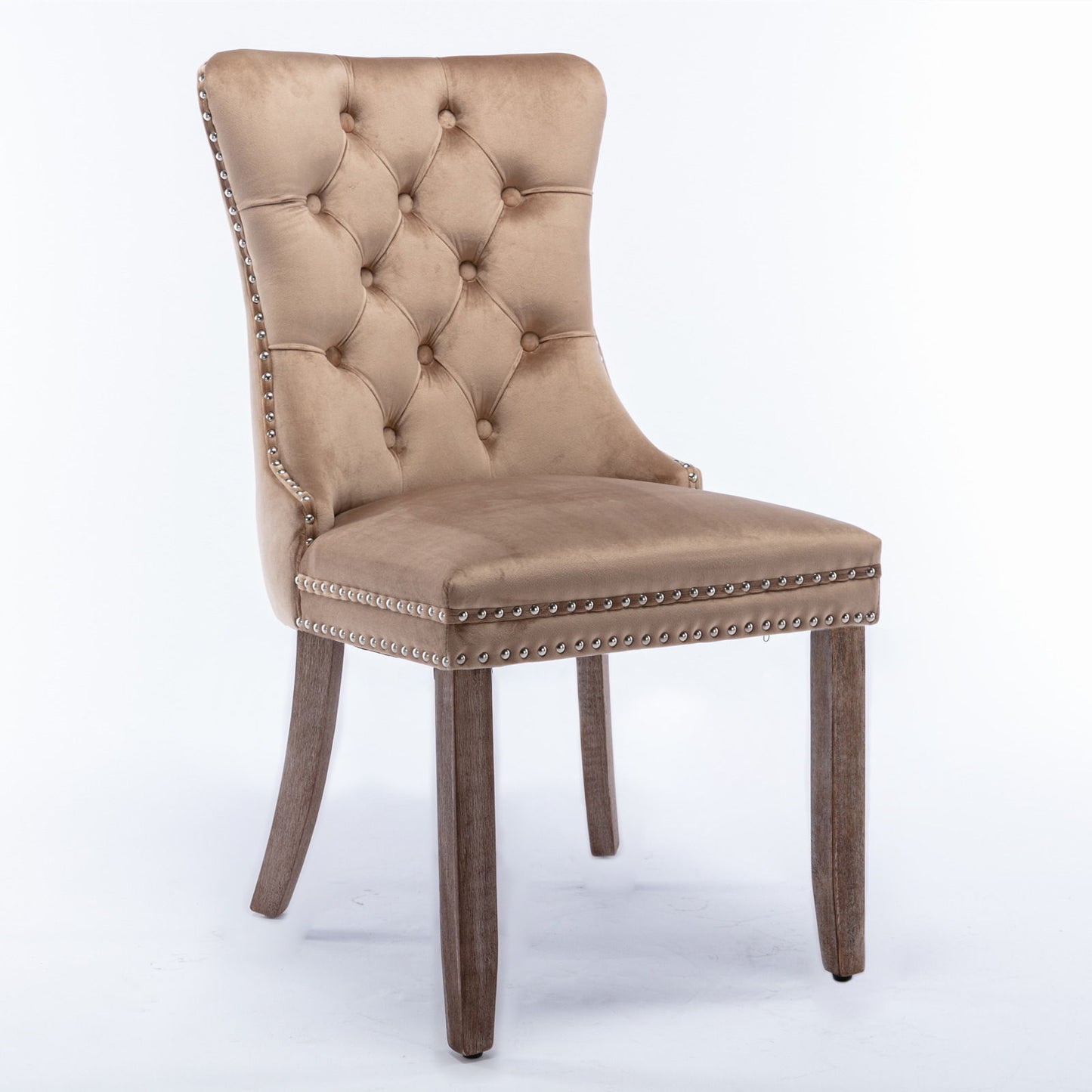 The Nikki Modern Velvet Upholstered Dining Chair set features a high-end tufted backrest, decorative nailhead trim, and solid wood legs, shown here in light brown against a plain white background.