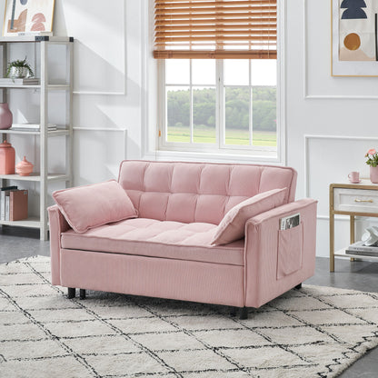 A modern living room with a light pink Folding Sofa Bed With Adjustable Back, featuring side pockets, sits on a patterned rug. The space includes a large window with wooden blinds, white walls, shelves, and a small decorated side table.