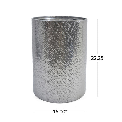 Modern Round Accent Table with a hammered, textured silver metal surface; tall and cylindrical, it measures 22.25" high and 16" in diameter.