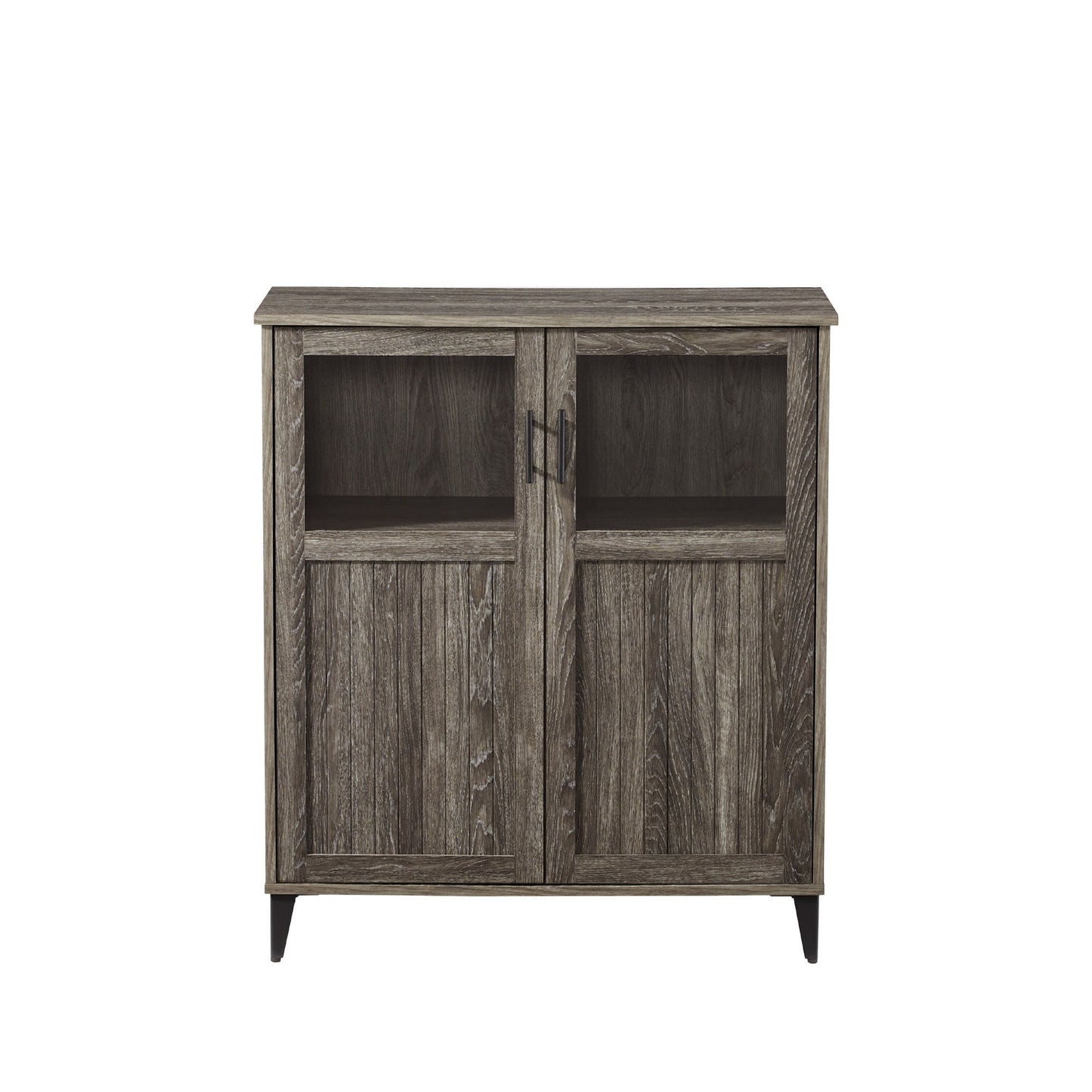The Modern Grooved Door Accent Cabinet features two doors with rectangular glass panels on top, vertical wood paneling below, a weathered gray finish, metal handles, and short legs.