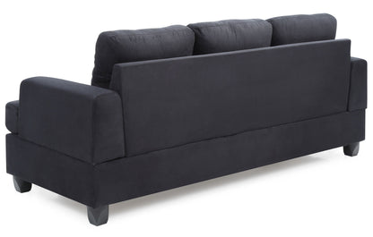 The Sandridge - Sofa is a modern dark-colored piece seen from the back, featuring three seat cushions, wide armrests, and block-style legs.