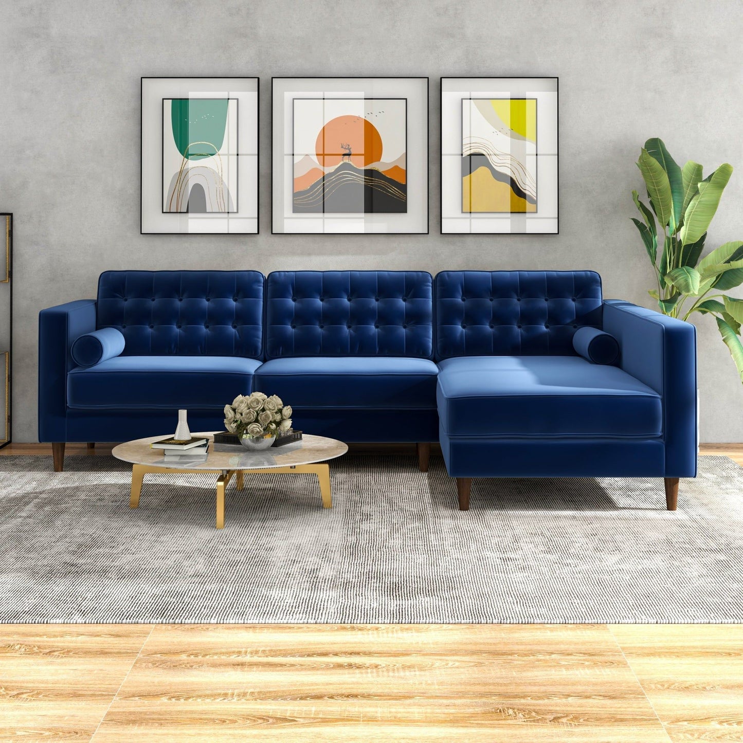A modern living room with the Christian Mid-Century Modern Design Sectional Sofa in blue, a round wooden coffee table with flowers, abstract art on a gray wall, a large green plant, and a light gray rug on wood flooring.