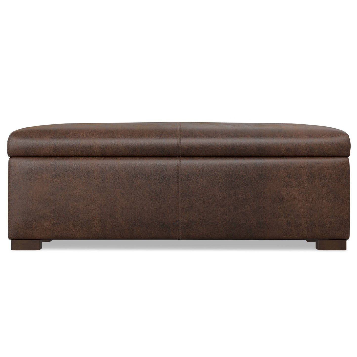 The Gabbie Coffee Table Upholstered Storage Ottoman features a rectangular, brown leather design with a cushioned top and short block legs, shown from the front on a white background.