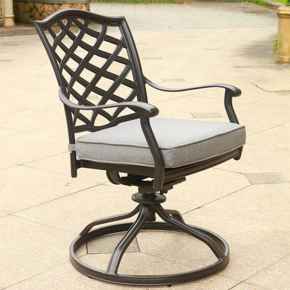 An Outdoor Patio Aluminum Swivel Rocker Dining Chair With Cushion (Set of 2) features a lattice backrest, gray padded seat, and circular swivel base, displayed on a tiled patio.
