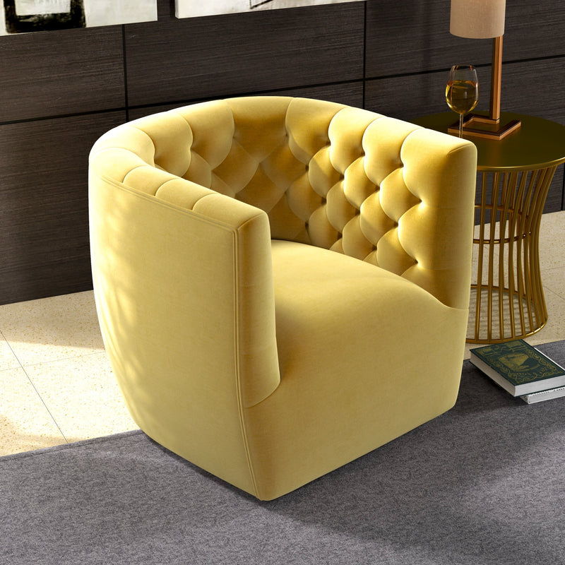 The Delaney - Ergonomic Design Swivel Chair in yellow velvet with a tufted, curved back sits on a gray rug next to a gold side table, lamp, and books in a stylish, sunlit room.