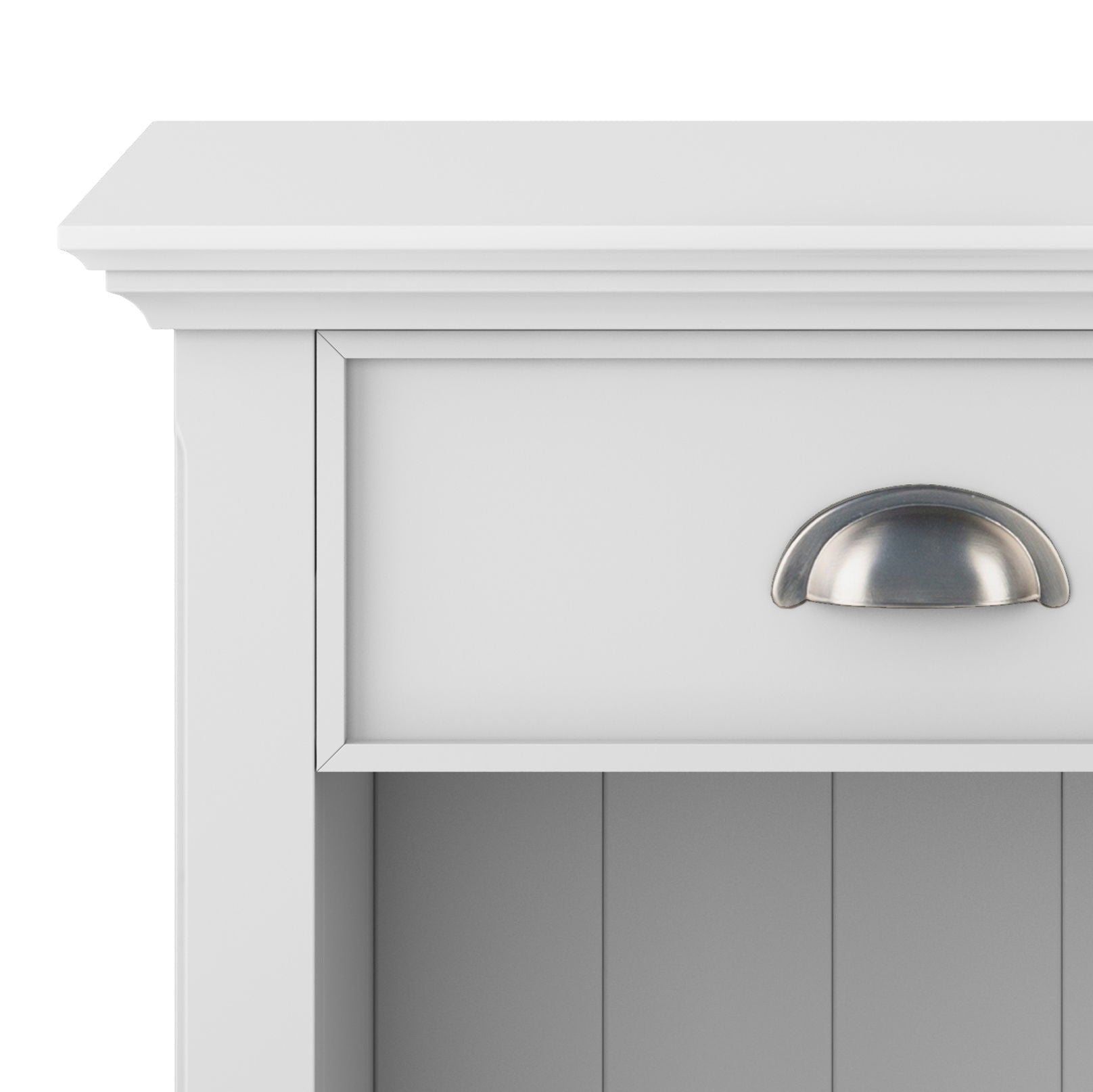 Close-up of the top section of the Acadian - Bedside Table, Handcrafted: a white wooden cabinet with a single drawer featuring a silver cup pull handle and an open shelf below.