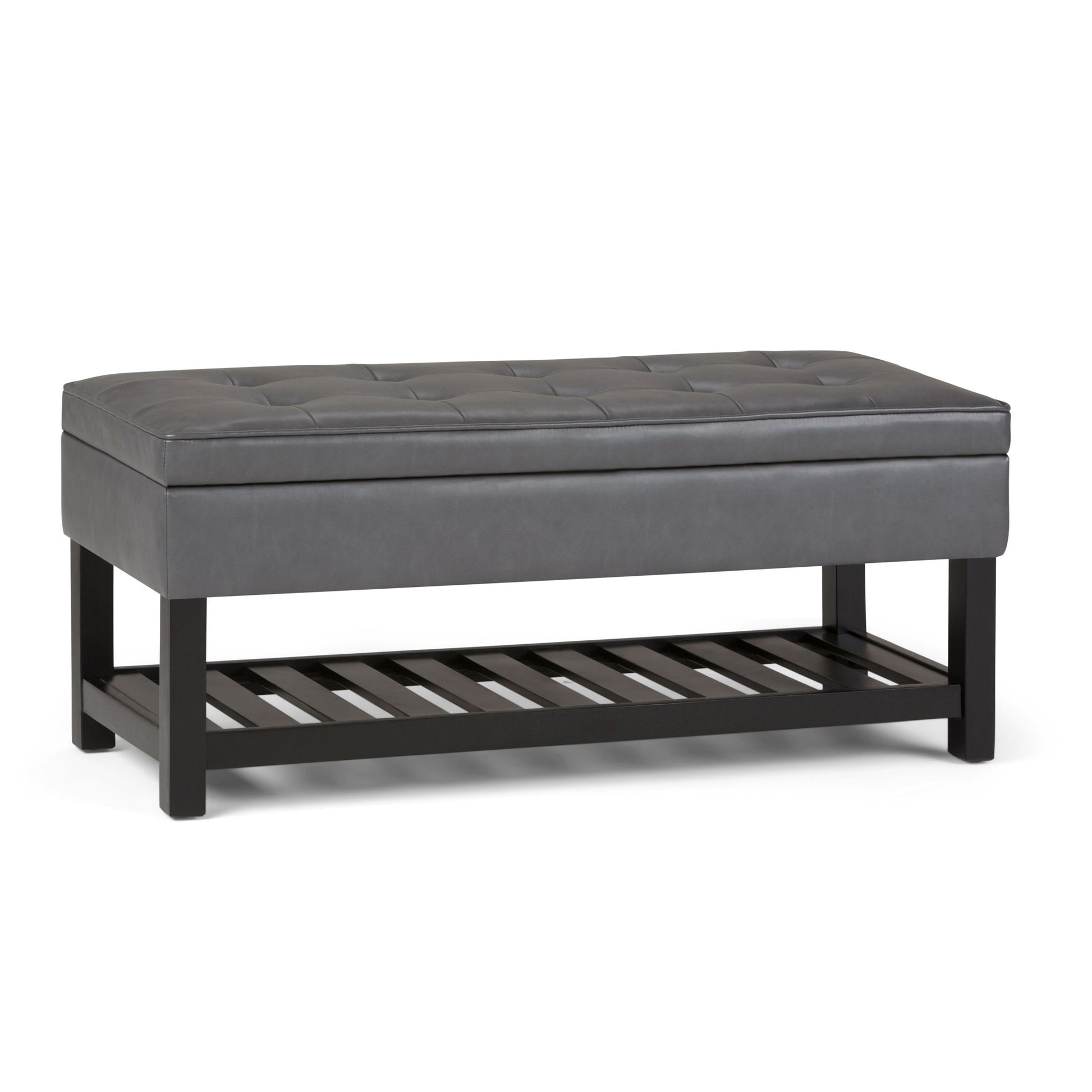 The Cosmopolitan - Storage Ottoman Bench With Open Bottom features a rectangular gray tufted padded seat, black wooden legs, and a slatted storage shelf, shown against a white background.