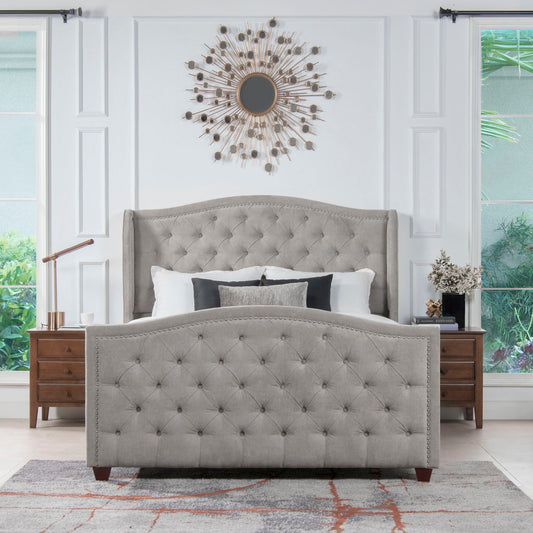 A stylish bedroom featuring the Marcella Upholstered Shelter Headboard Bed Set in gray, paired with wooden nightstands, a modern sunburst mirror, decorative accents, large windows with black curtain rods, and a patterned rug.