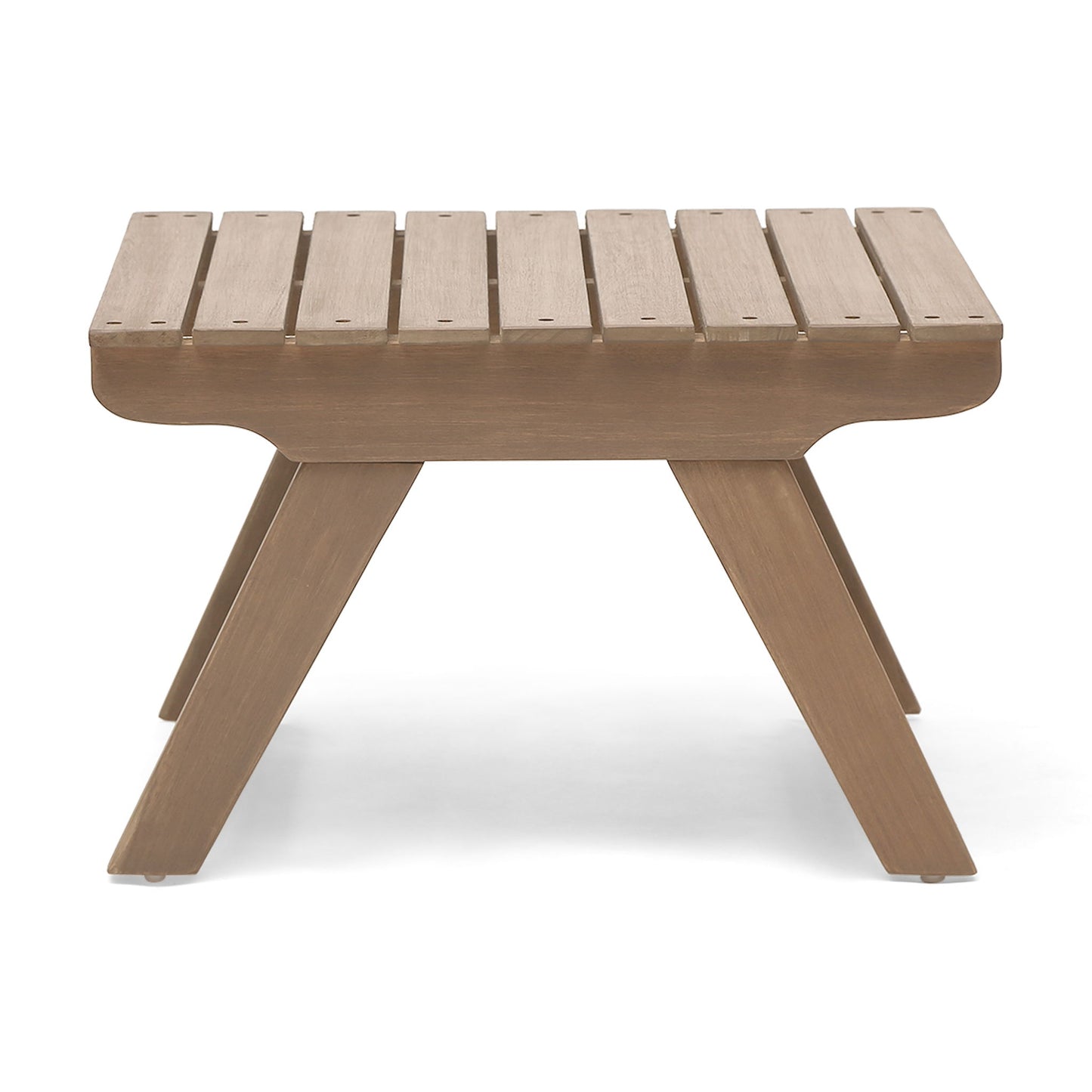 The Sedona Outdoor Side Table features an open slat rectangular top and four angled legs in a light brown finish. Its simple, modern design is showcased on a white background.