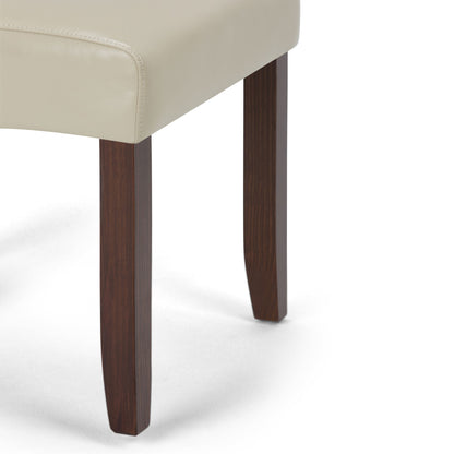Close-up of the Cosmopolitan - Deluxe Tufted Parson Upholstered Chair (Set of 2), featuring a light beige upholstered seat and two dark brown wooden legs against a white background.