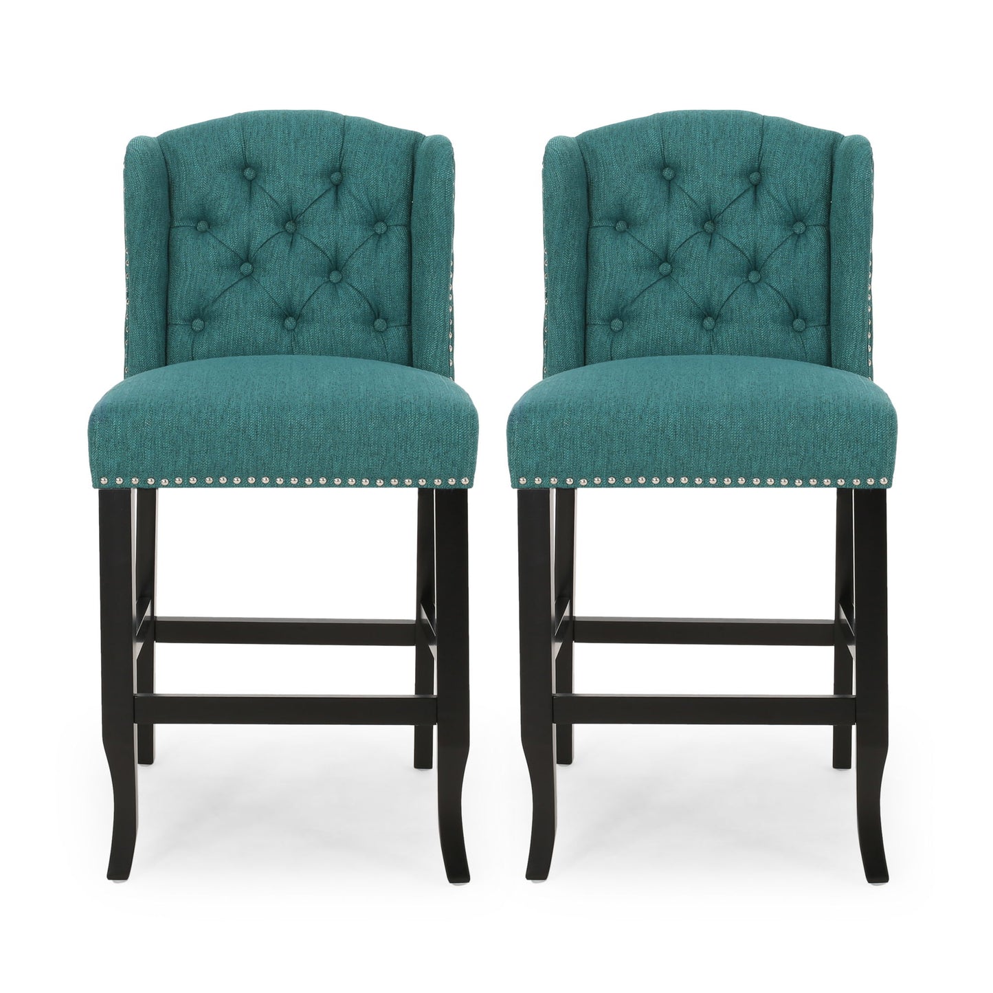 The Vienna Fabric Tufted Counter Stool With Nailhead Accents (Set of 2) features teal upholstery, tufted backs, silver nailhead trim, and dark wooden legs, shown side by side against a white background.
