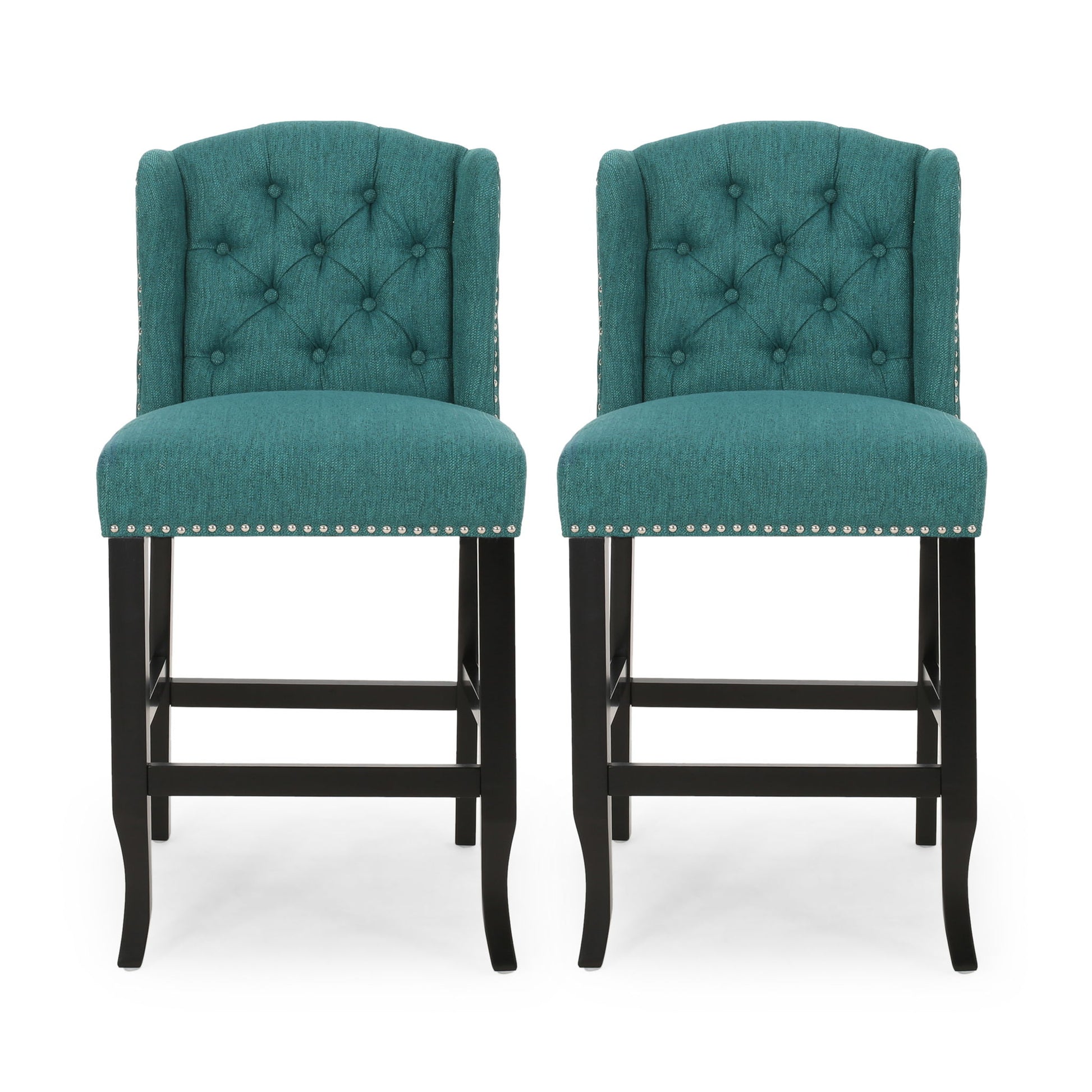 The Vienna Fabric Tufted Counter Stool With Nailhead Accents (Set of 2) features teal upholstery, tufted backs, silver nailhead trim, and dark wooden legs, shown side by side against a white background.