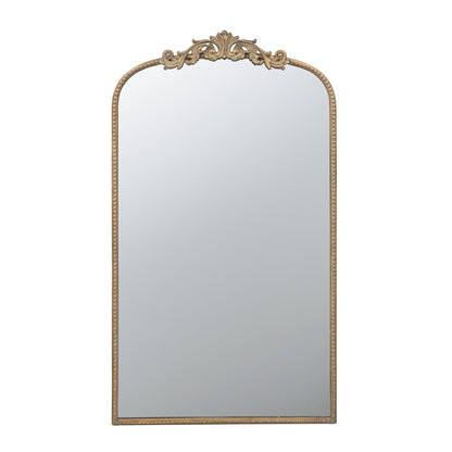The Arch Mirror, a Baroque inspired wall decor piece for bathroom, bedroom, or living room, features a tall gold ornate frame with intricate top detailing and a simple edge border.
