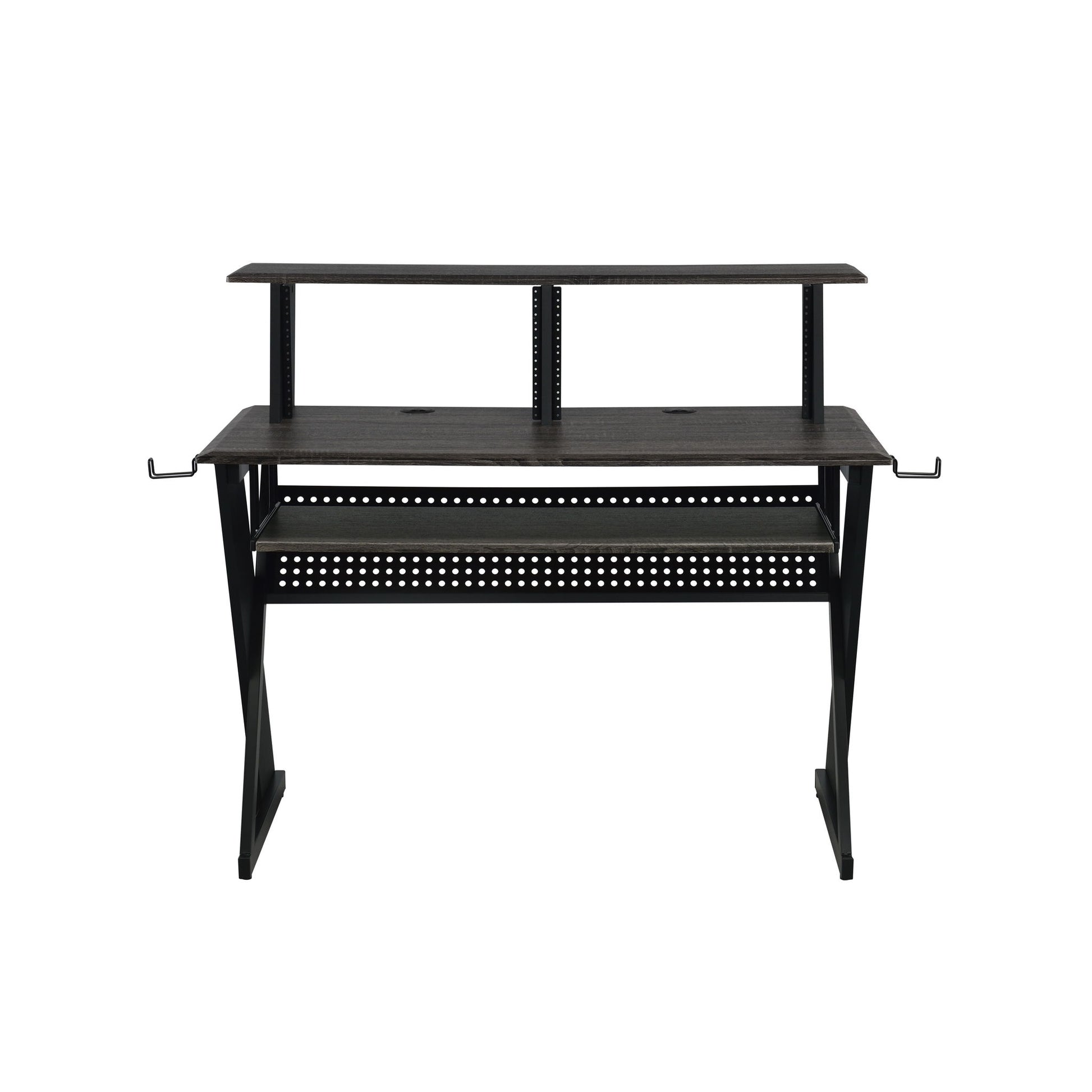 The Humanity - Music Desk - Black features a dark wood surface, raised shelf, metal frame, two side hooks, and perforated paneling underneath—ideal for studio or office use.