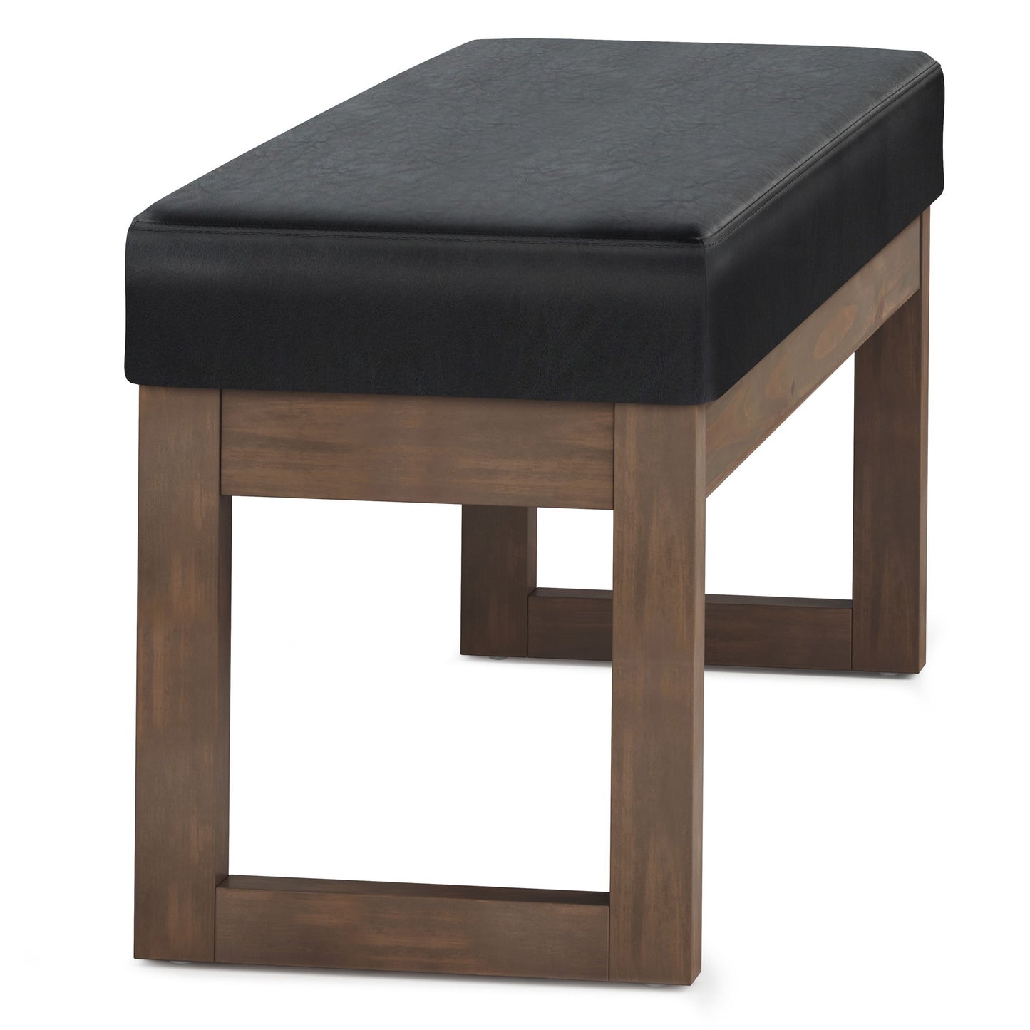 The Milltown Upholstered Ottoman Bench features a rectangular black cushioned seat and sturdy brown-finished wooden legs, shown against a white background.