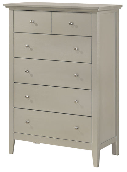 The Hammond Chest is a tall, light gray wooden dresser with six drawers, each with round silver knobs. Featuring a simple, modern design, it stands on four short legs for an elegant touch.