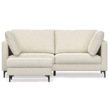 The Ava - Mid Century Sofa With Ottoman Set is a modern, light beige sectional with clean lines, two seat and back cushions, two angled side pillows, black legs, and a left-side chaise.