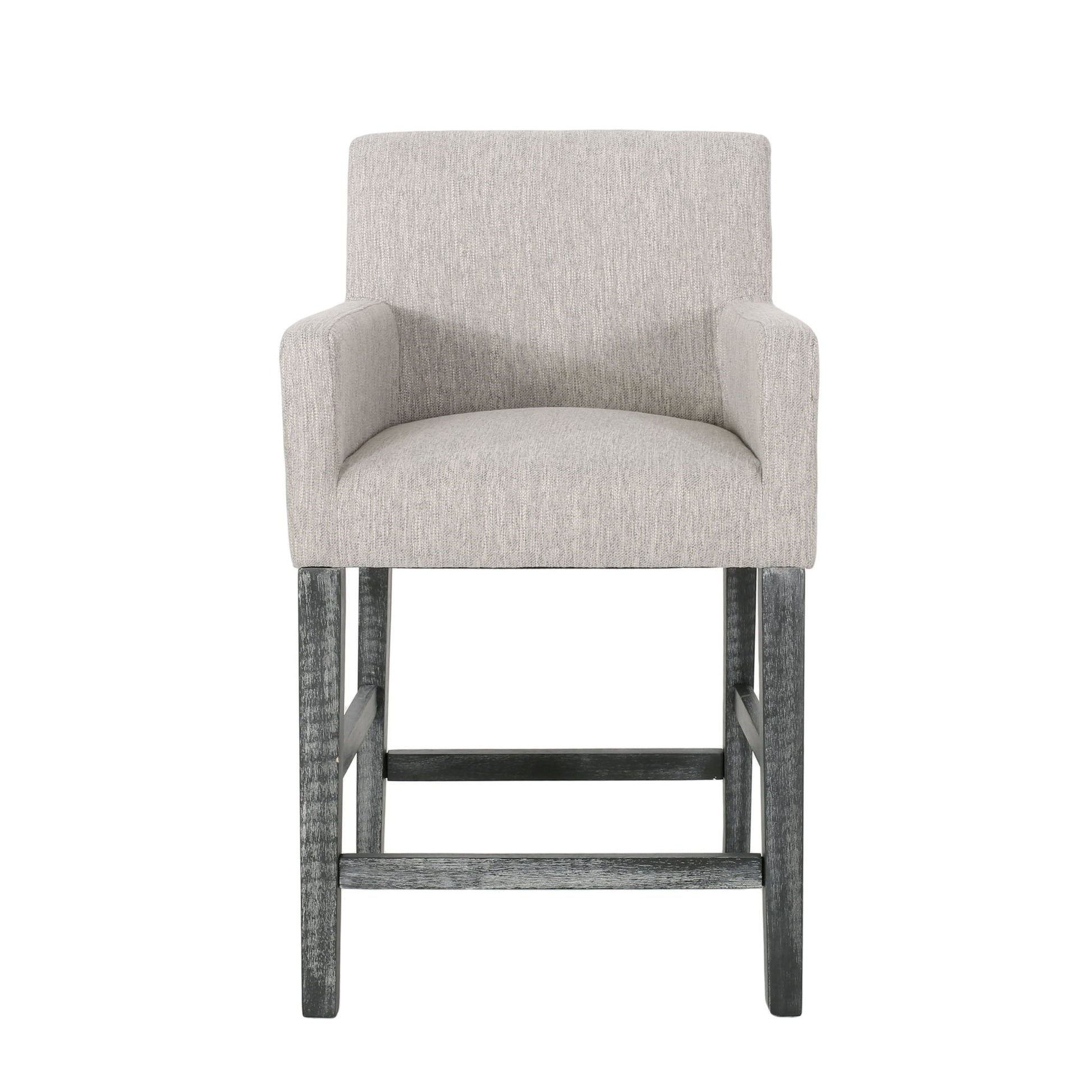 The Charmed Upholstered Counter Stool features light gray fabric, round arms, and dark H frame wooden legs, shown from the front against a white background.