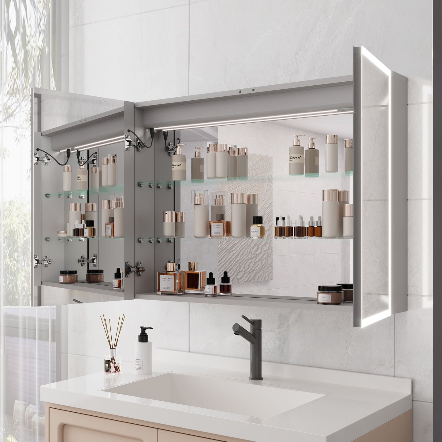 A modern bathroom features a Bathroom Medicine Cabinet With Lights, showcasing neatly arranged skincare and cosmetics on glass shelves above a sink with a soap dispenser and faucet. The LED medicine cabinet includes a mirror and defogger.