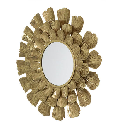 The Round Metal Mirror With Trumpet Vine Motif - Gold features a decorative, gold frame with layered, textured vines radiating outward for a bold, floral-inspired design.