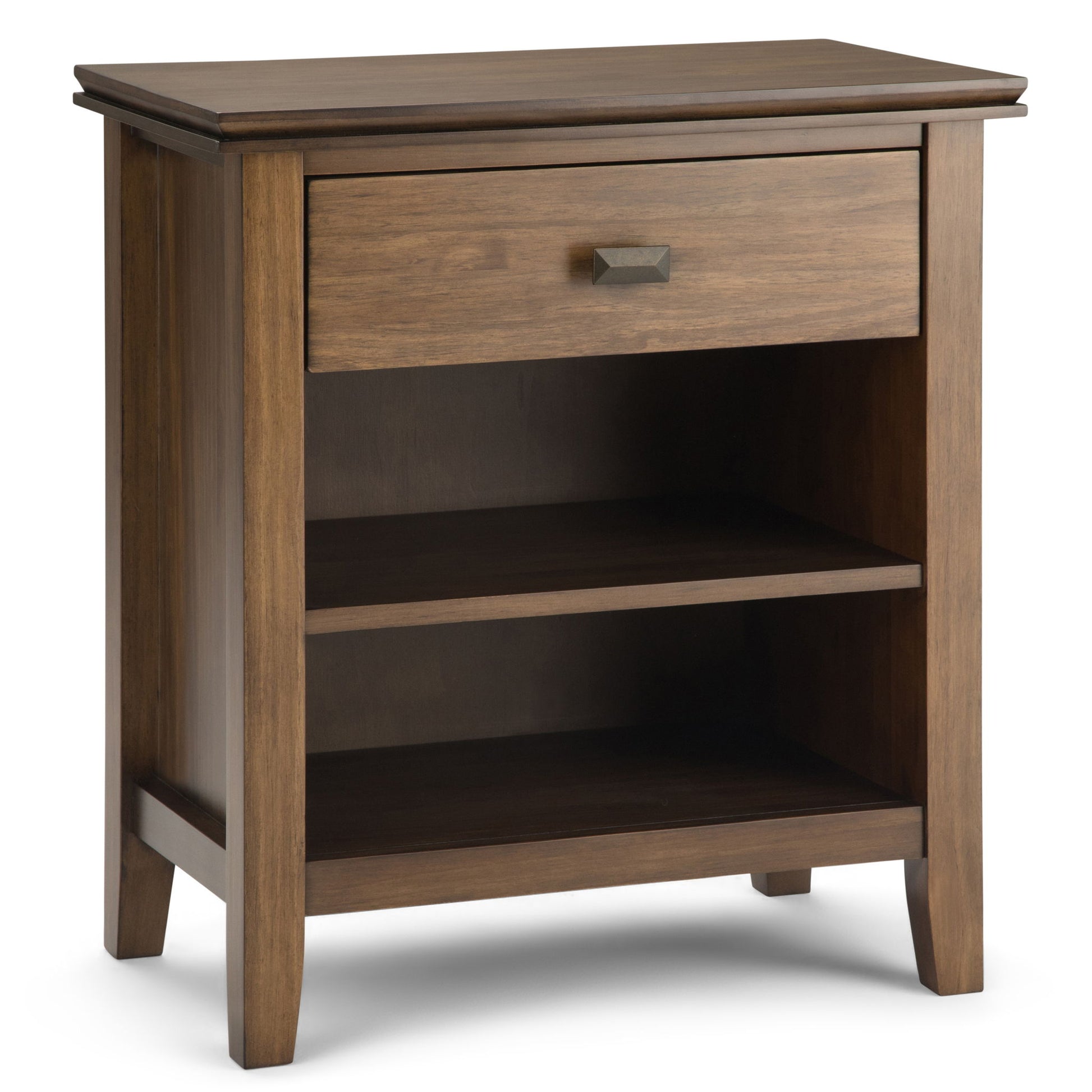 The Artisan - Handcrafted Bedside Table features a warm brown wood finish, four legs, a single drawer with a metal handle, and two open shelves below the drawer.