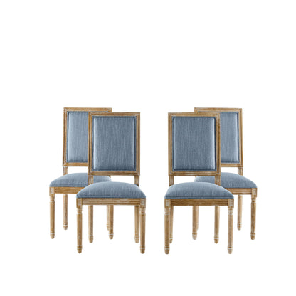 Four French Country Style Dining Chairs with blue upholstered seats and backs, featuring fluted legs, are arranged in two rows on a white background.