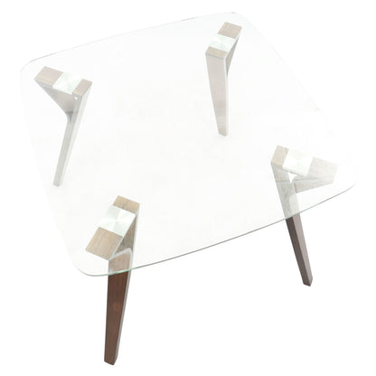 The Folia - Mid Century Modern Dinette Table features a clear square glass top and four angled wooden legs positioned at each corner. Photographed from above on a white background.