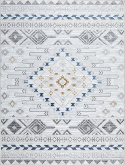 The Legacy - GC_CAM8001 Area Rug features a geometric pattern in blue, gray, and beige on white, with a large central diamond and rows of smaller diamonds, arrows, and zigzags.