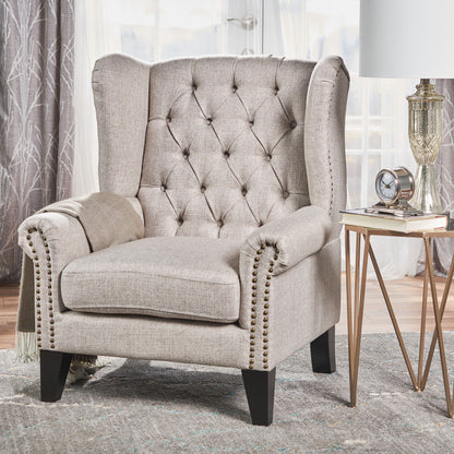 A Mid Century Modern Arm Reading Chair for Living Room sits by a side table with a lamp and clock, in a bright space with curtains and a patterned rug.
