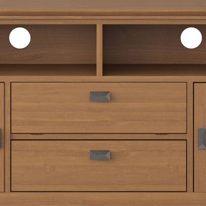 Close-up of the Artisan - TV Media Stand, showing two open shelves at the top with circular cut-outs at the back, and two drawers below with rectangular metal handles.