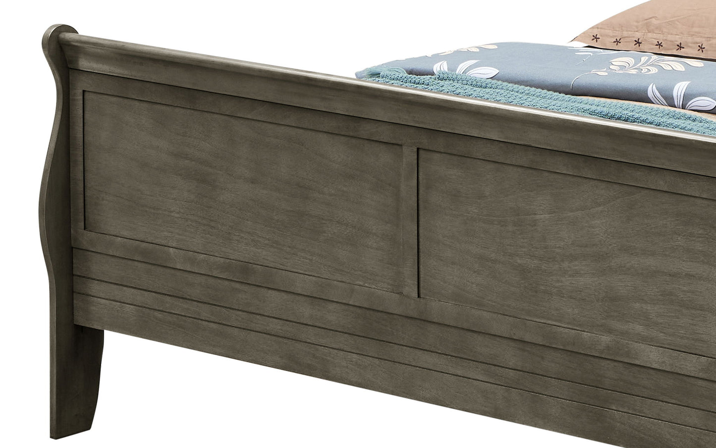 A close-up of the Panel Sleigh Bed's wooden footboard in a gray finish, featuring a blue floral-patterned blanket and a beige sheet partially visible at the top.