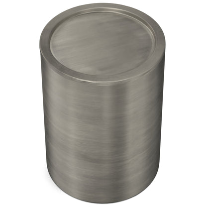 The Corbin Handcrafted Metal Side Table, a cylindrical piece with a brushed finish, flat circular top, and smooth sides, is shown against a white background.