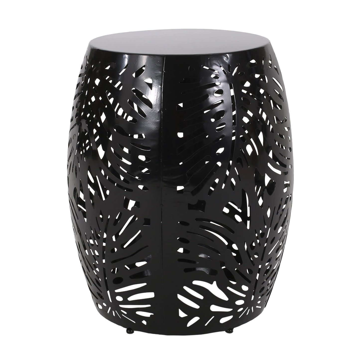 The Modern Design Metal End Table, Large, is a black drum-shaped table with perforated tropical leaf patterns in the metal, allowing light and air to flow through its stylish cutouts.