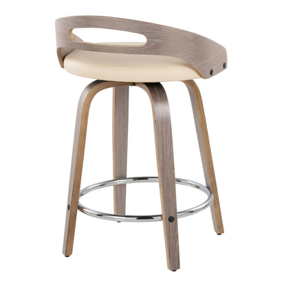 The Cassis Mid Century Modern Fixed Height Counter Stool features a light wood frame, curved backrest with open slot, cream cushioned seat, four legs, swivel function, and a round chrome footrest. Sold as a set of 2.