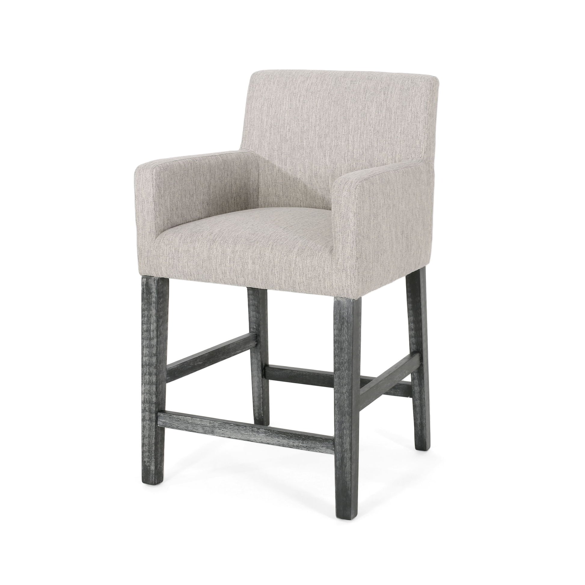 The Charmed Upholstered Counter Stool features round arms, a light gray upholstered seat, back and arms, plus four dark wooden legs with an H-frame base for support.