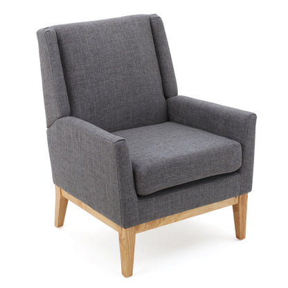 The Modern Accent Chair With Padded Cushion Seat features dark gray fabric upholstery, a boxy design, padded seat and backrest, and light wooden legs.