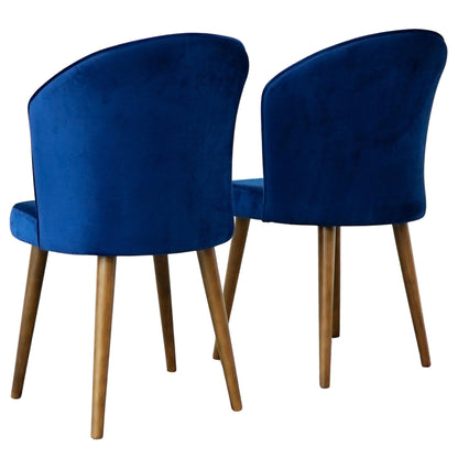 Set of two Parsons Comfortable Dining Chairs featuring curved backs, dark blue fabric upholstery, and four wooden legs, arranged side by side and angled slightly away from the camera.
